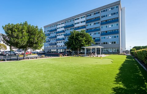 View of building exterior and grass 